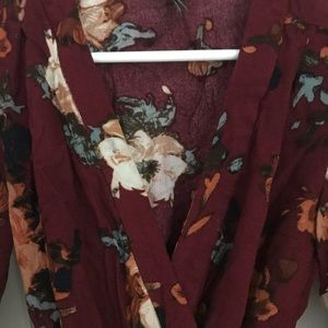 Anthropology red floral wrap blouse.